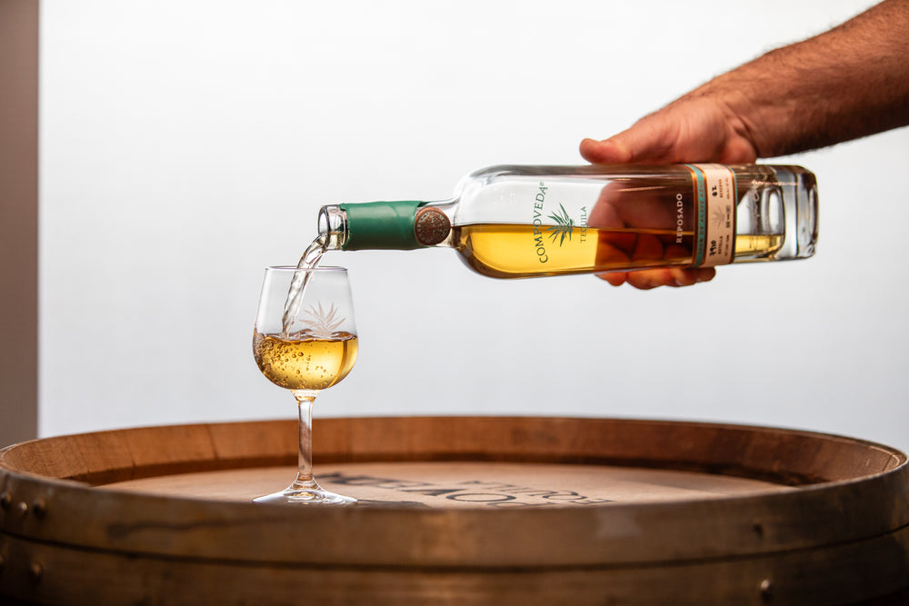 Pouring tequila into a glass